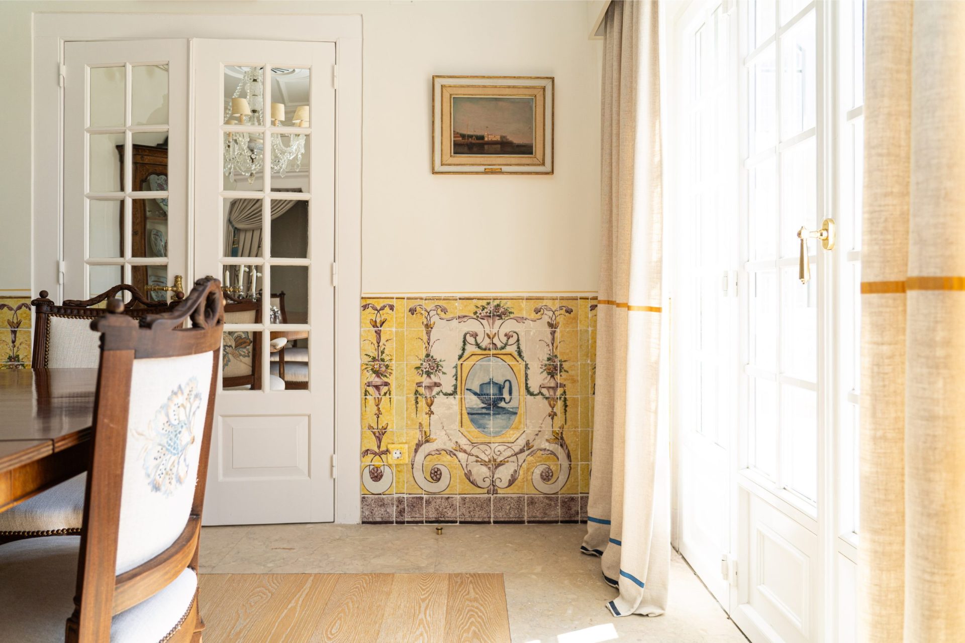 Neoclassical tile panels on a dining room at the Vintage Hotel, Monte Estoril.